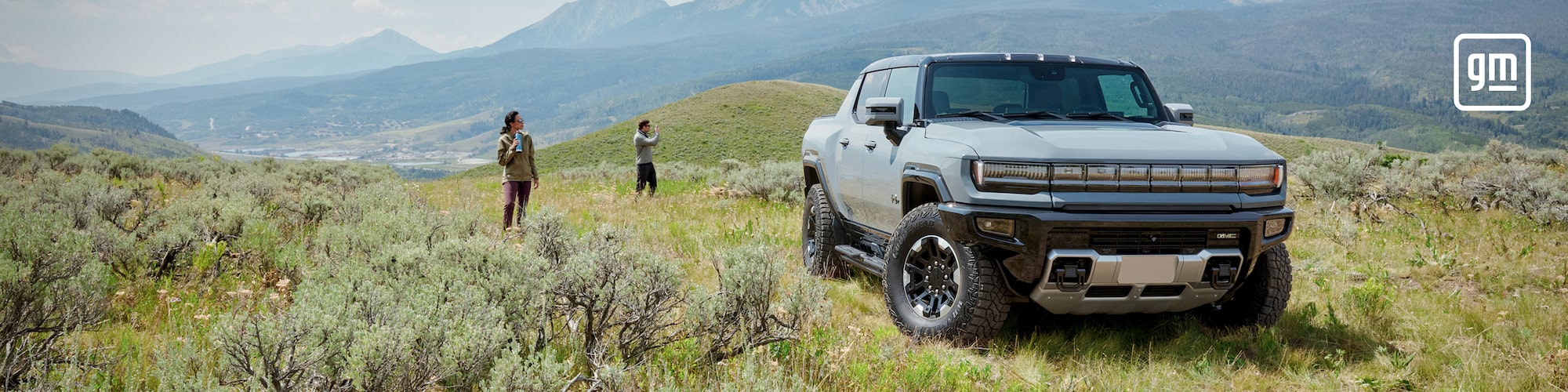 Hummer parked in the mountains